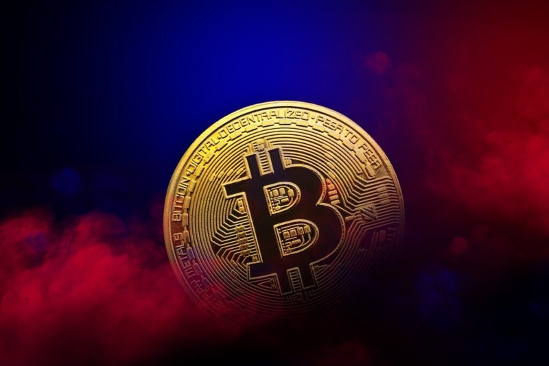Golden-Bitcoin-Coin-Is-In-Red-And-Blue-S.jpeg